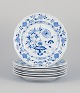 Meissen, Germany. A set of seven Blue Onion pattern dinner plates. Hand-painted.