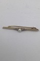 David Andersen 
14K Gold Brooch 
with Pearl 
Measures 5.4 cm 
(2.12 inch) 
Weight 2.4 gr. 
(0.08 oz) ...