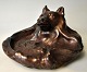 Kongstrand, 
Søren (1872 - 
1951) Denmark: 
Bowl with dog. 
Clay with 
luster glaze. 
Signed. H: 9 
cm. ...