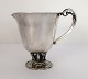 Georg Jensen. 
Silver cream 
jug (925). 
Model 421. 
Height 9 cm. 
Produced 1933 - 
1945.