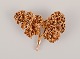 Egger, Denmark. 
"Flora Danica" 
brooch in 
gold-plated 
sterling 
silver.
Approximately 
from the ...