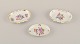 Herend, 
Hungary. Three 
small oval 
bowls 
hand-painted 
with polychrome 
flower motifs 
and gold ...