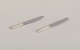 Georg Jensen, a pair of Bernadotte short-handled dinner knives with Raadvad 
blade in stainless steel.