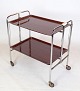 Rolling table with imitation mahogni surface with chromed metal frame and original ...