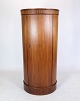 This 
oval-shaped 
rosewood 
pedestal 
cabinet, 
designed by 
Johannes Sorth 
for Bornholms 
Møbelfabrik ...