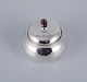 Georg Jensen sugar bowl in sterling silver with an ebony lid knob.