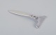 Georg Jensen 
Cactus child 
pusher in 
sterling 
silver.
1915-1932 
hallmark.
Dated 1931.
In ...