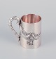 Luen-Wo, Shanghai. Silver cup with handle. Relief dragon motif. Handle 
resembling bamboo.