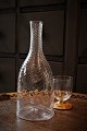 Swedish 1800s mouth-blown water carafe in twisted glass. H:28cm. Dia.:11cm.