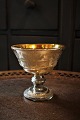 19th century 
bowl on foot in 
poor man's 
silver / 
Mercury Glass 
with leaf 
decorations on 
the ...