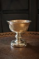 19th century 
bowl on foot in 
poor man's 
silver / 
Mercury Glass 
with leaf 
decorations on 
the side ...