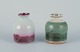 Elly Kuch (1929-2008) og Wilhelm Kuch (1925-2022). To unika keramikvaser. 
Den ene vase med glasur i grønne toner.
Den anden vase med rødlig glasur på sandfarvet bund.