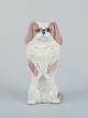 Royal 
Copenhagen, 
porcelain 
figurine of 
standing 
Pekingese dog.
Model 1776.
Marked.
In ...