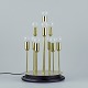 Sülken Leuchten, Germany, modernist designer lamp for ten bulbs.Brass on a black wooden ...