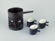Digsmed Design, Denmark. Cast iron fondue set. Bowls with enamel lining. Serves 
six people.