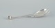 Early and rare 
Georg Jensen 
"Ornamental" 
pattern 
serving-fork 
chased with 
foliage and 
with a ...
