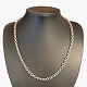 A necklace in 
14k white gold.
Clasp with two 
safety catches.
L. 51 cm. W. 
0,5 cm.
Stamped ...