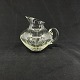 Height 11.5 cm.Finely cut glass jug from the 1960s. It has an attached handle and a polished ...