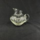 Height 11.5 cm.
Finely cut 
glass jug from 
the 1960s. It 
has an attached 
handle and a 
polished ...