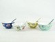Set of four 
Chinese 
porcelain bowls 
and spoons from 
around the 
1930s. Sold as 
a set only
H:5.5 ...
