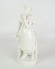 Royal figurine 
from Royal 
Copenhagen, 
model 4131, 
depicting a 
girl with 
flowers and 
chickens, ...