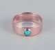 Scandinavian goldsmith. 14 karat gold ring adorned with a turquoise stone.