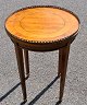 French rosewood 
lamp table, 
20th century. 
Brass edge and 
bronze 
decorations. 
Height: 58 cm. 
...