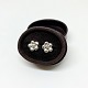 Ole Lynggaard 
flower earrings 
of 18k white 
gold. Diam 8mm. 
Set with 
diamonds, 
0,06ct (2 x ...