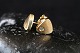 Beautiful studs in 14 carat gold, with inlaid clear stone. The ear studs are exclusive when they ...