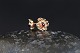 Beautifully detailed earrings in 14 carat gold, designed as small flowers. The petals of the ...