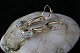 Beautiful gold 
earrings in 14 
carat gold. The 
earrings are 
designed with 
pendants 
containing ...