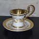 Cup and saucer 
In porcelain 
from KPM 
Berlin, made in 
Germany around 
1850. Gold 
decorations and 
...