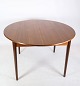 Teak dining 
table with 
built-in 
additional 
plate and round 
legs of Danish 
design from 
around the ...