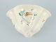 Kähler. Ceramic 
wall-mounted 
plant holder. 
Glaze in light 
tones. Floral 
motif.
Approximately 
...