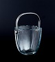 Danish design. Modernist ice bucket in art glass with a handle in sterling 
silver. Sleek Danish design.