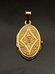 18 carat gold 
medallion 2 x 
3.1 cm. weight 
5.3 grams item 
no. 549731