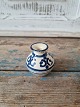 Kähler 
miniature vase 
with blue 
decoration 
Appears with a 
few glaze 
faults - see 
picture. ...