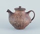 Gutte Eriksen (1918-2008), own studio, Denmark.
Unique ceramic teapot. Raku-fired. Glaze in brown and yellow tones.