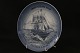 Ship plate, No. 
12, from 1990. 
The plate is 
painted with 
Iron steam 
ship, with the 
text S.S. ...