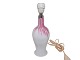 Holmegaard 
Torino pink and 
white Torino 
table lamp, 
opal glass.
Designed by 
Michael Bang in 
...