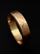 14 carat gold 
bangle inside 6 
x 5.5 cm. W. 
1.5 cm. weight 
25.7 grams from 
jeweler Herman 
...