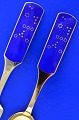 Anton Michelsen 
christmas 
cutlery, gilded 
sterlingsilver 
with an inlaid 
enamel motif.. 
Christmas ...
