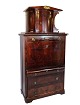 German 
secretary of 
patinated elm 
wood with top 
and brass 
fittings 
decorated with 
marquetry from 
...