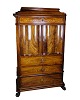 Large cabinet of polished mahogany and walnut decorated with intarsia, drawers at the bottom and ...