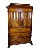 Large cabinet 
of polished 
mahogany and 
walnut 
decorated with 
intarsia, 
drawers at the 
bottom and ...