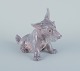 Dahl Jensen, 
porcelain 
figurine of a 
sitting 
Scottish 
Terrier.
Model number 
1078.
Design Jens 
...