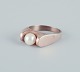 Danish 
goldsmith, 14 
karat gold ring 
adorned with a 
cultured pearl. 
Modernist 
design.
From the ...