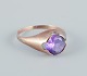 Danish goldsmith, 14 karat gold ring adorned with light violet semi-precious 
gemstone. Art Deco design.