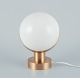 Vilhelm Lauritzen (1894-1984). Wall lamp/table lamp made of brass and opal glass. Large ...