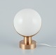 Vilhelm 
Lauritzen 
(1894-1984). 
Wall lamp/table 
lamp made of 
brass and opal 
glass. Large 
...